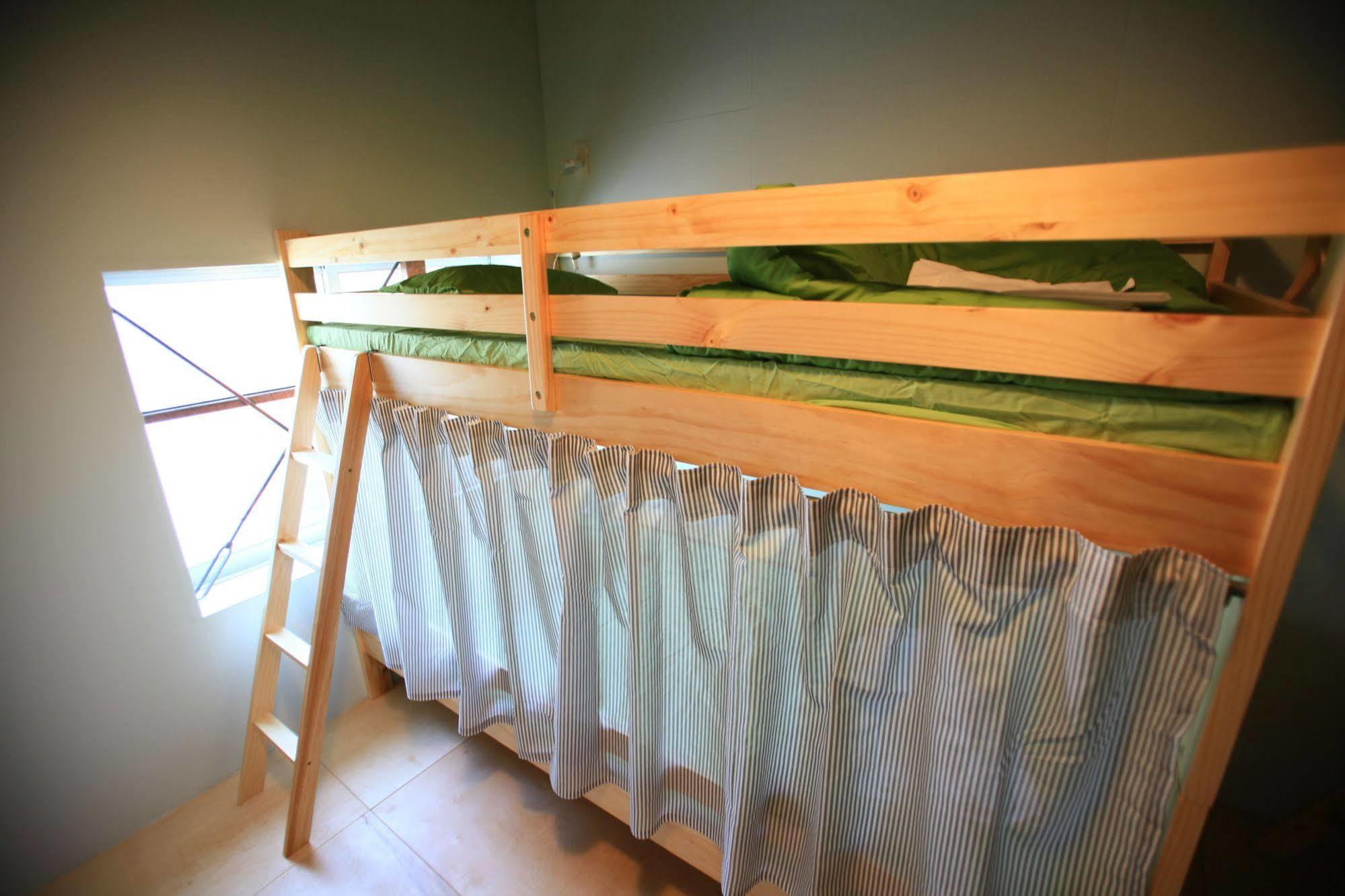 אוקיאמה Kamp Houkan-Cho Backpacker'S Inn & Lounge מראה חיצוני תמונה